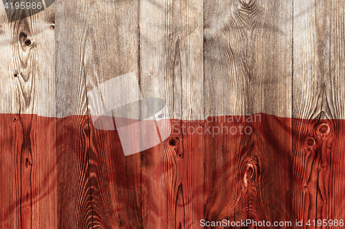 Image of National flag of Poland, wooden background