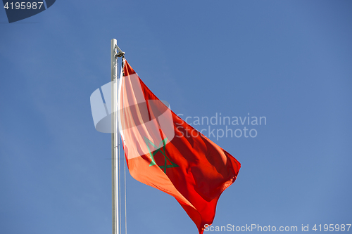 Image of National flag of Morocco on a flagpole