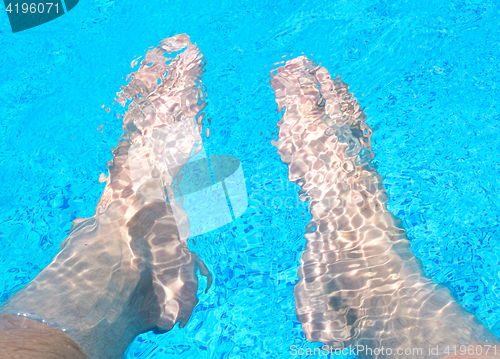 Image of legs in the water