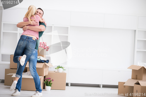 Image of happy Young couple moving in new house