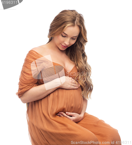 Image of happy pregnant woman touching her big belly