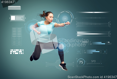 Image of happy sporty young woman jumping in fighting pose