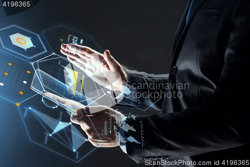 Image of close up of businessman with transparent tablet pc