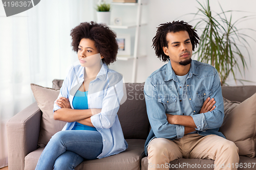 Image of unhappy couple having argument at home