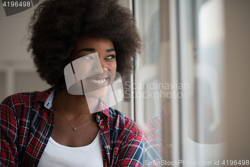 Image of portrait of a young beautiful black woman