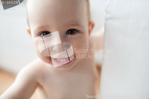 Image of close up of happy little baby boy or girl at home