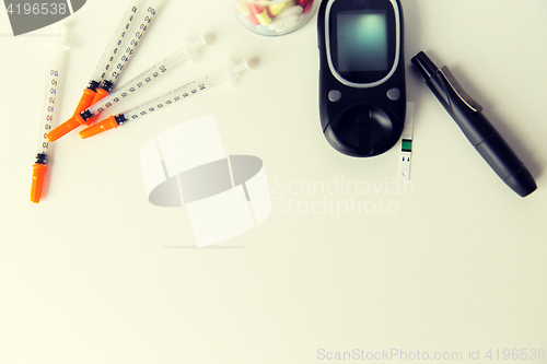 Image of close up of diabedic tools and medication