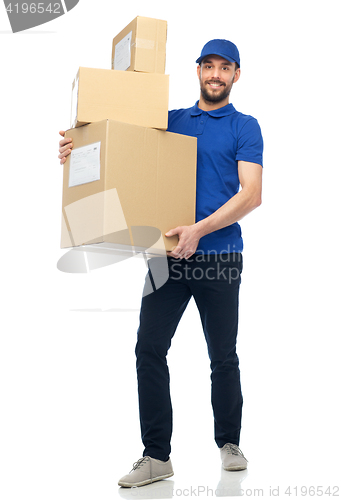 Image of happy delivery man with parcel boxes