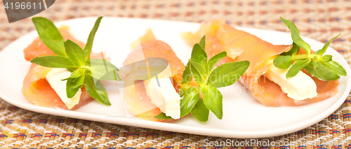 Image of appetizers with red fish