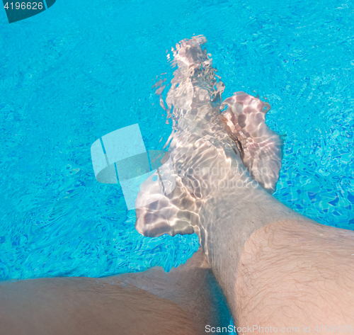 Image of legs in the water