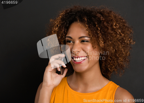 Image of On the phone with her Best Friend