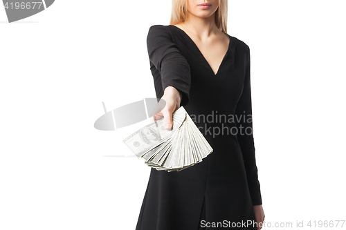 Image of Woman hold dollars, close up