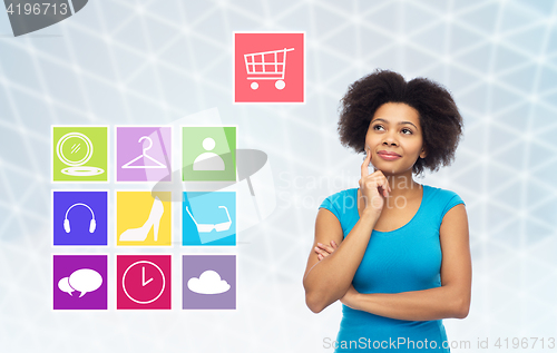 Image of happy afro american young woman with menu icons