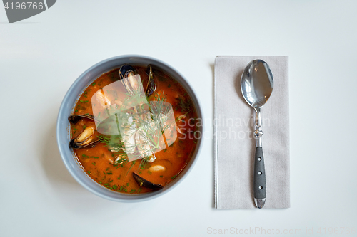 Image of seafood soup with fish and blue mussels in bowl