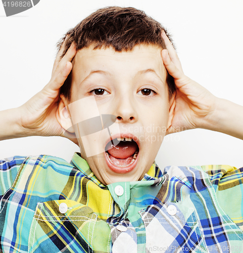 Image of young pretty little cute boy kid wondering, posing emotional face isolated on white background, gesture happy smiling close up, lifestyle real people concept