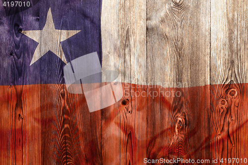 Image of National flag of Chile, wooden background