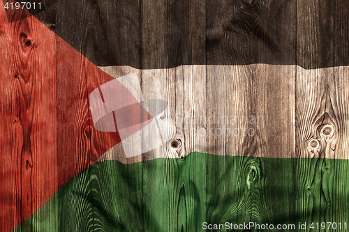 Image of National flag of Palestine, wooden background