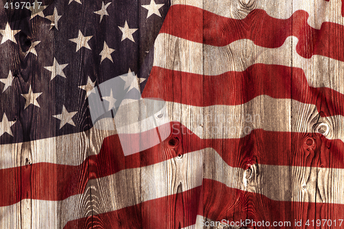 Image of National flag of USA, wooden background