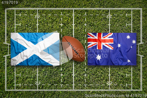 Image of Scotland vs. Australia flags on rugby field