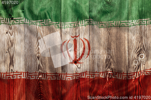 Image of National flag of Iran, wooden background