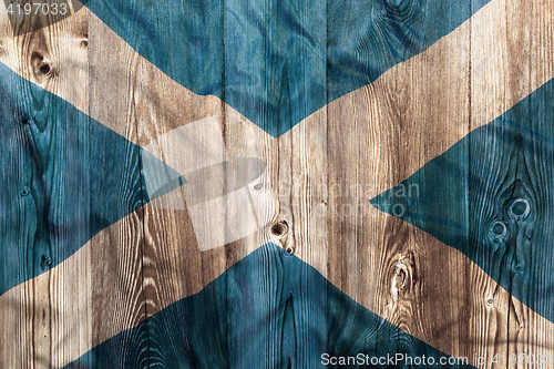 Image of National flag of Scotland, wooden background