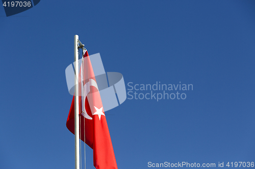 Image of National flag of Turkey on a flagpole