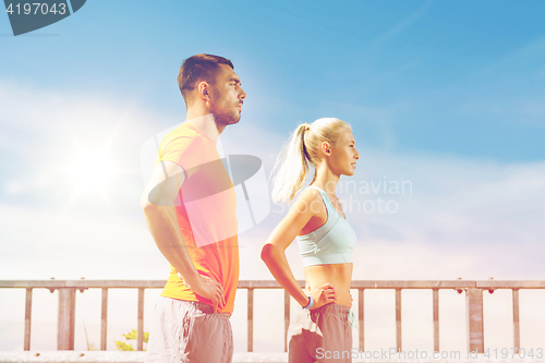 Image of sporty couple outdoors