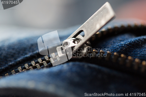 Image of close up of denim item or jeans zipper