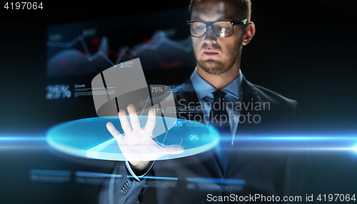 Image of businessman touching virtual chart projection