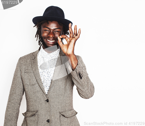 Image of young handsome afro american boy in stylish hipster hat gesturing emotional isolated on white background smiling, lifestyle people concept 