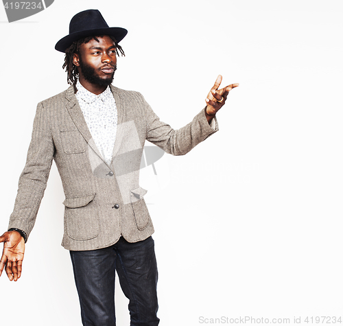 Image of young handsome afro american boy in stylish hipster hat gesturing emotional isolated on white background smiling, lifestyle people concept 