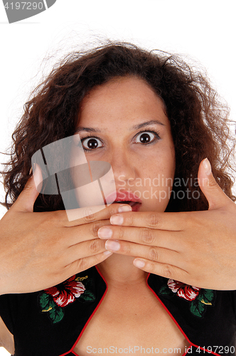 Image of Shocked woman with hand over mouth.