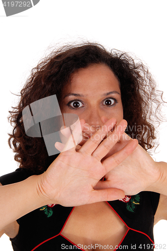 Image of Shocked woman with hand over mouth.