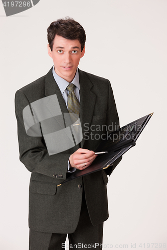 Image of Young Emotional Man In A Business Suit