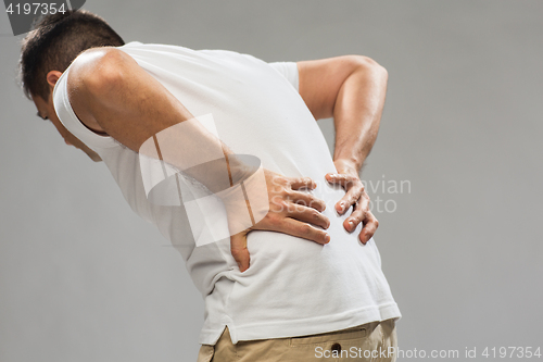 Image of close up of man suffering from backache