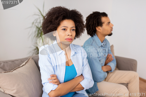 Image of unhappy couple having argument at home