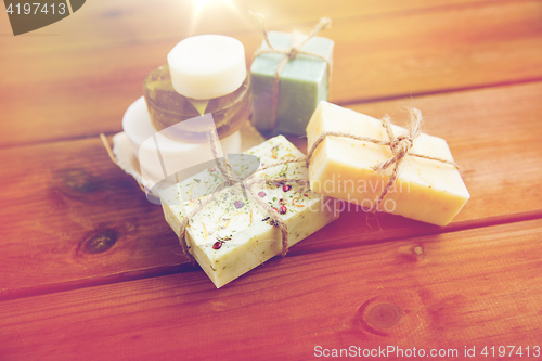 Image of close up of handmade soap bars on wood