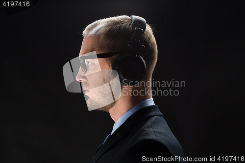 Image of businessman in headphones