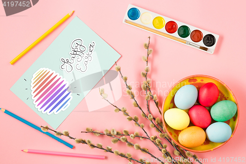 Image of The top view of easter on pink table office workplace