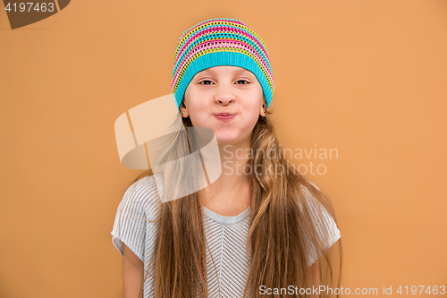 Image of The face of playful happy teen girl