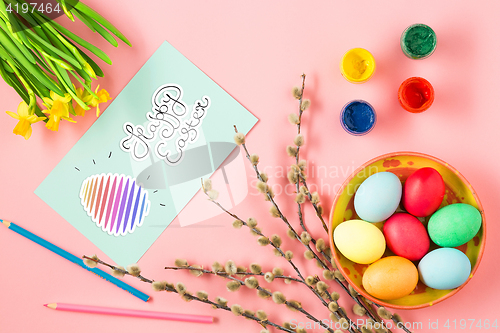 Image of The top view of easter on pink table office workplace