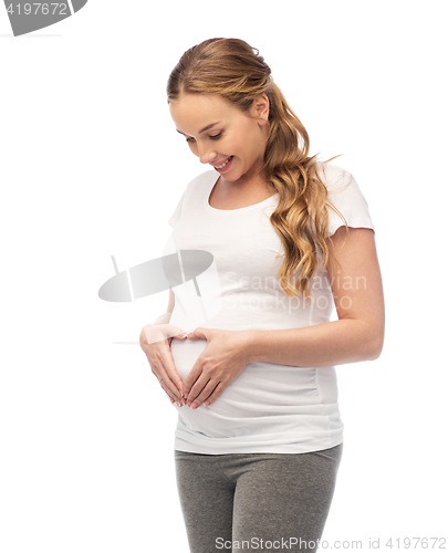 Image of happy pregnant woman showing heart gesture