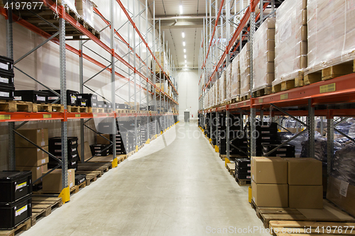 Image of cargo boxes storing at warehouse shelves