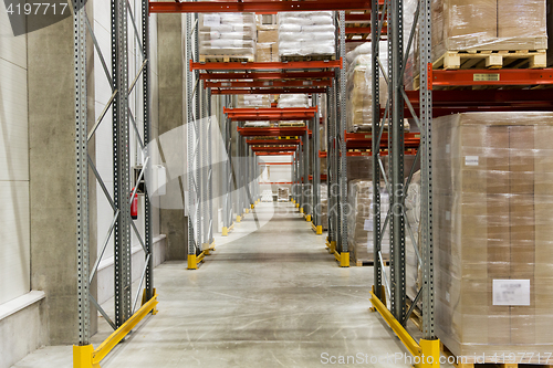 Image of cargo boxes storing at warehouse shelves