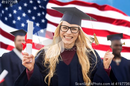 Image of happy student with diploma celebrating graduation