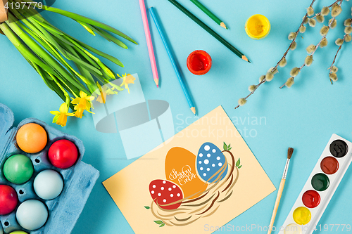 Image of The top view of easter on blue table office workplace