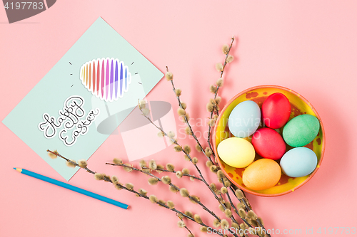 Image of The top view of easter on pink table office workplace