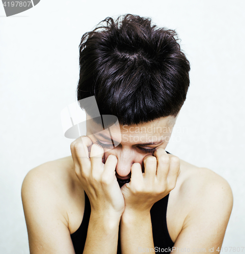 Image of portrait of young girl teenage looking bad like junkie isolated on white background, social issues concept 