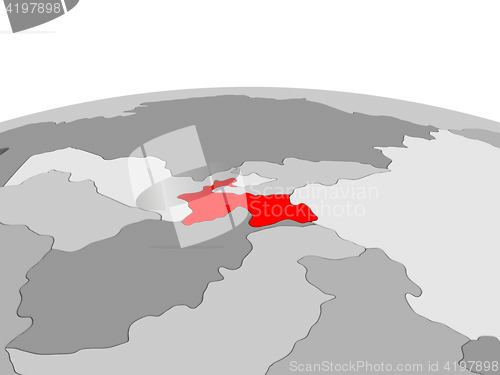 Image of Tajikistan on globe in red