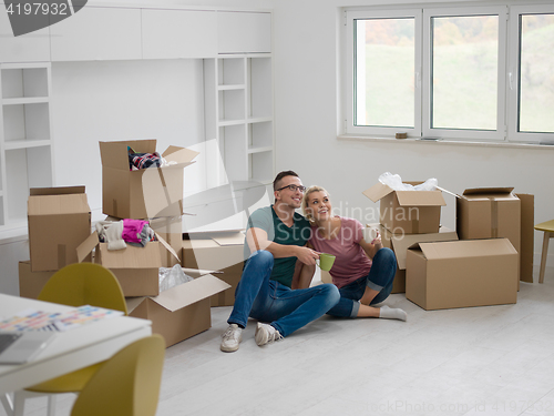 Image of young couple in new house